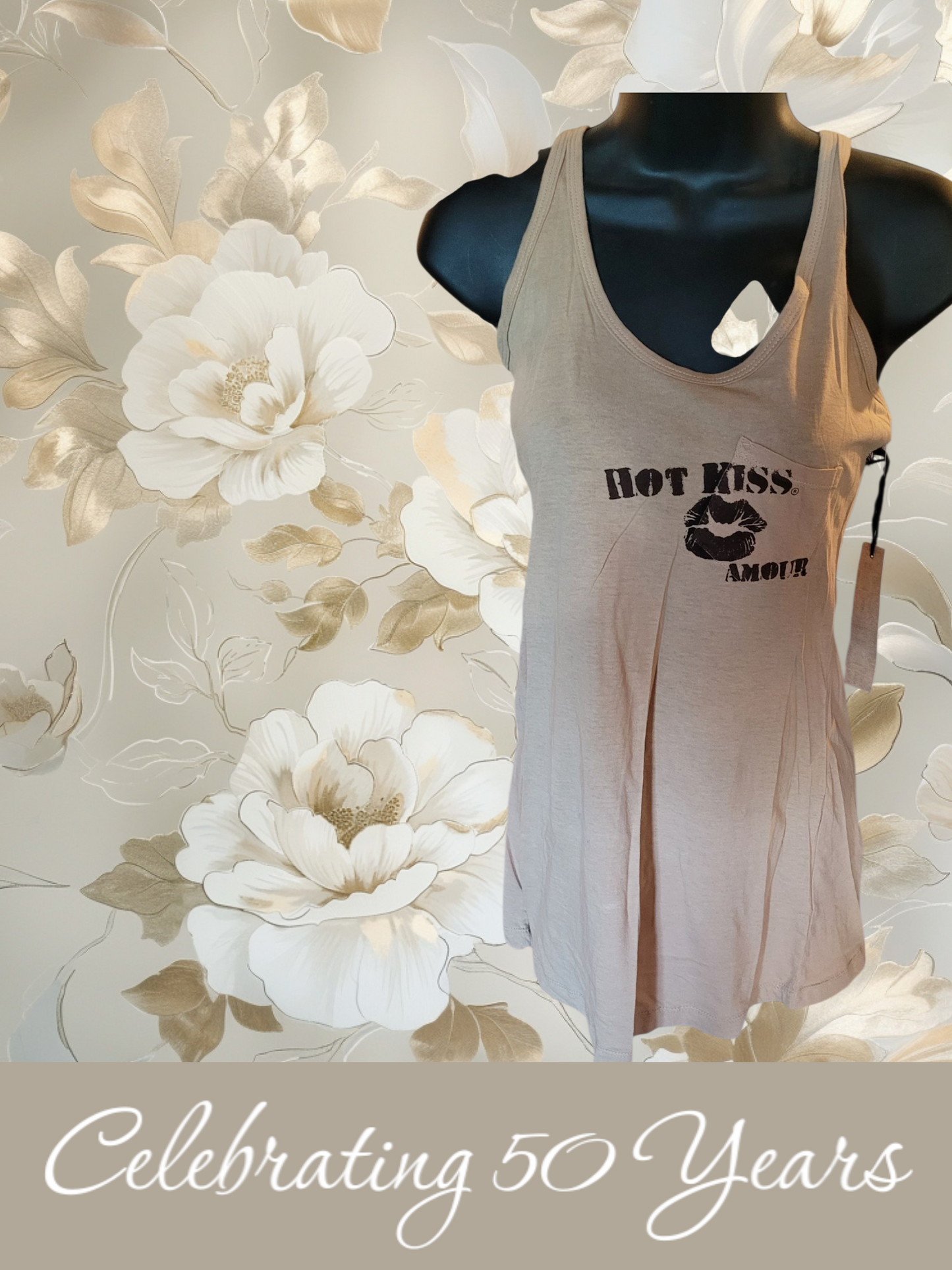 White tank top with text on a mannequin against a floral background with 'Celebrating 50 Years' text.