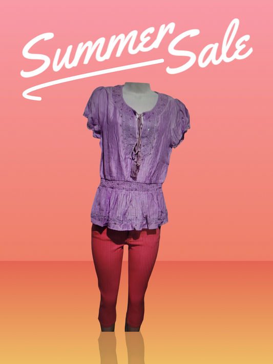 Purple top and red pant on a background with summer sale text