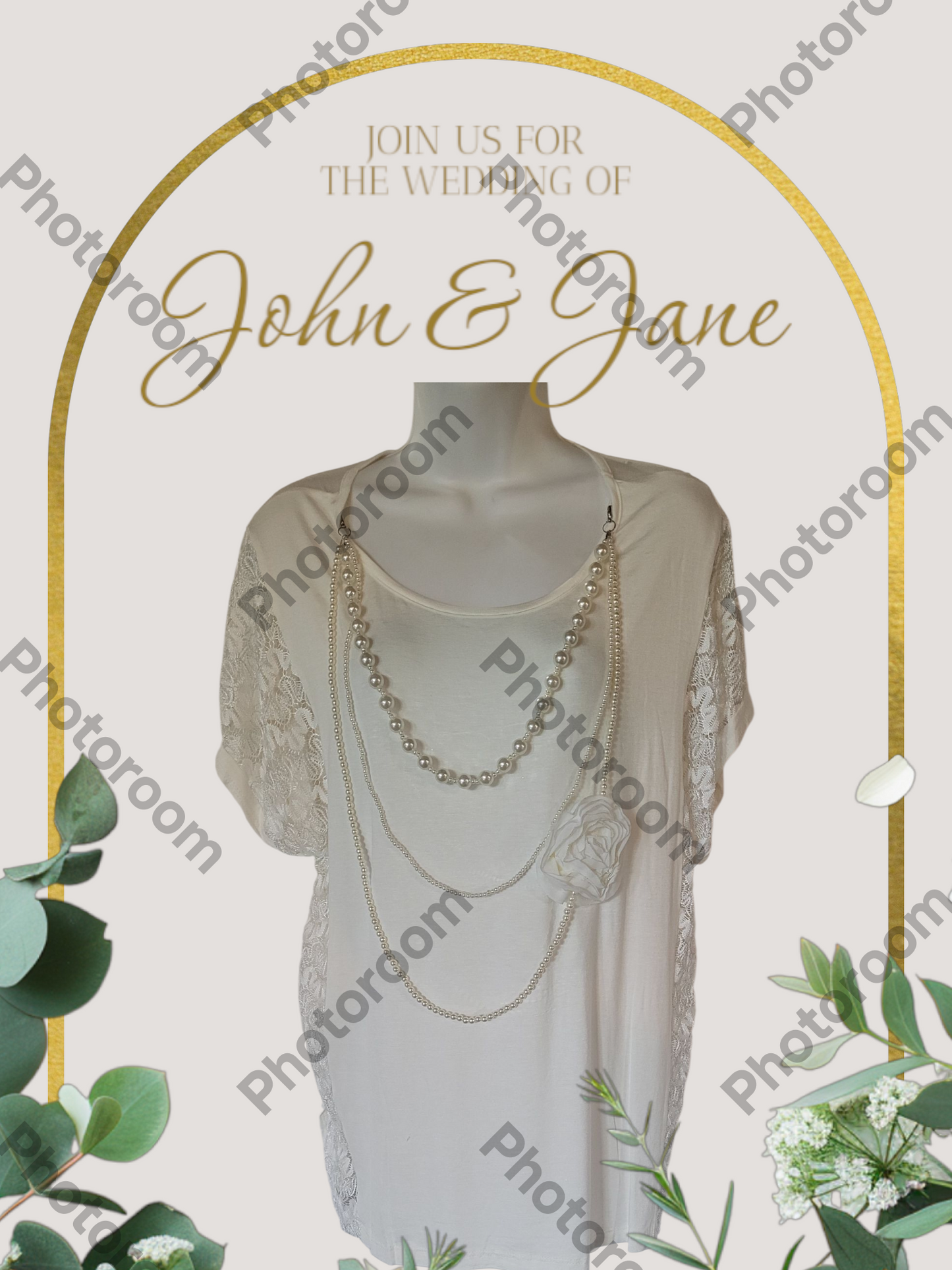 Wedding invitation with a dress and jewelry on a mannequin, framed by greenery and a gold arch.