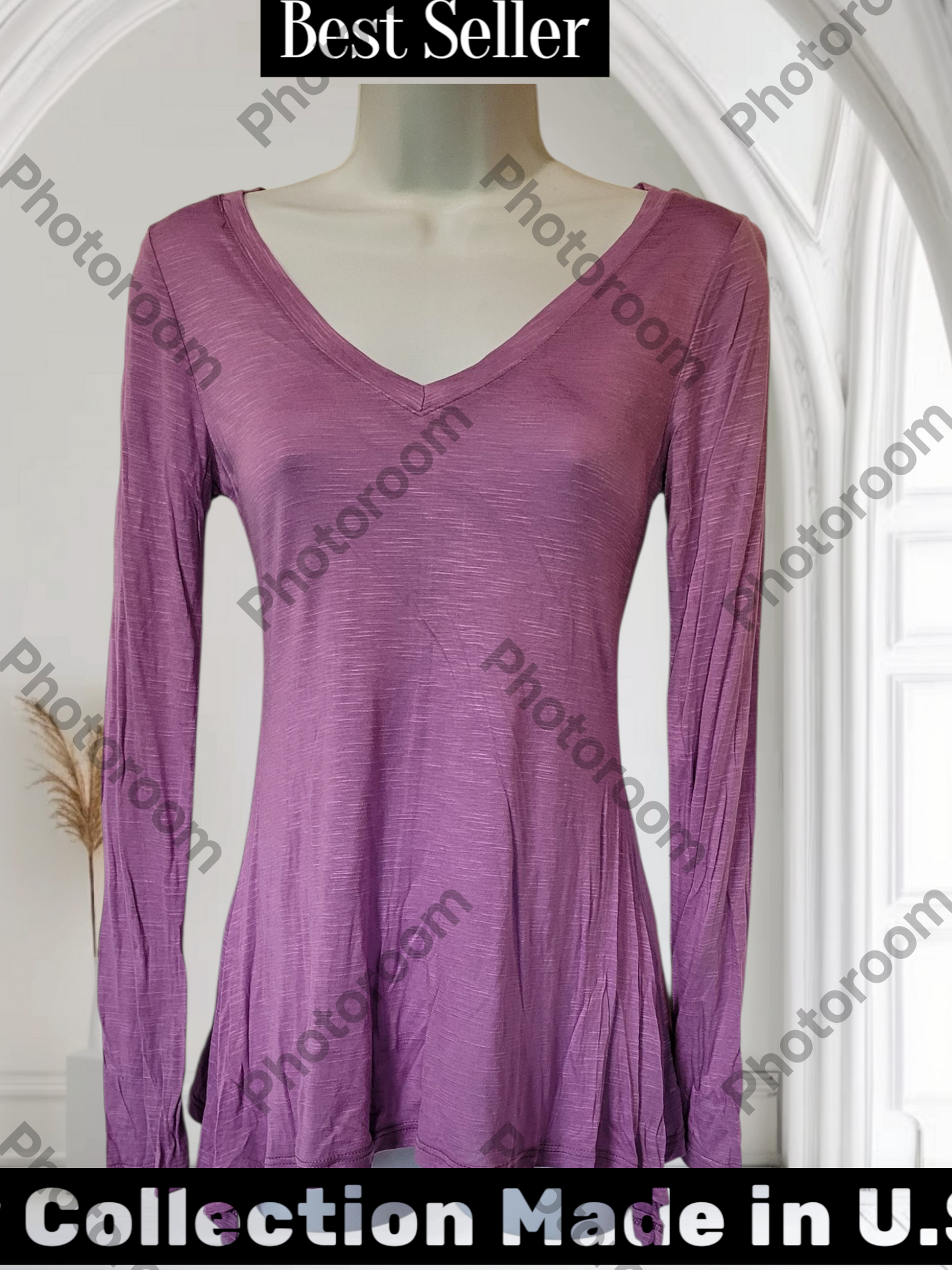 Purple long-sleeve dress on a mannequin with 'PhotoRoom' watermark