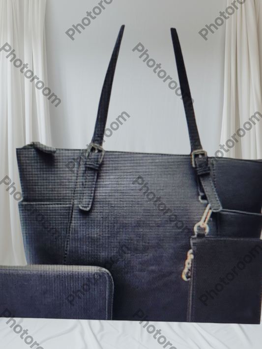 Black handbag with a strap on a white background