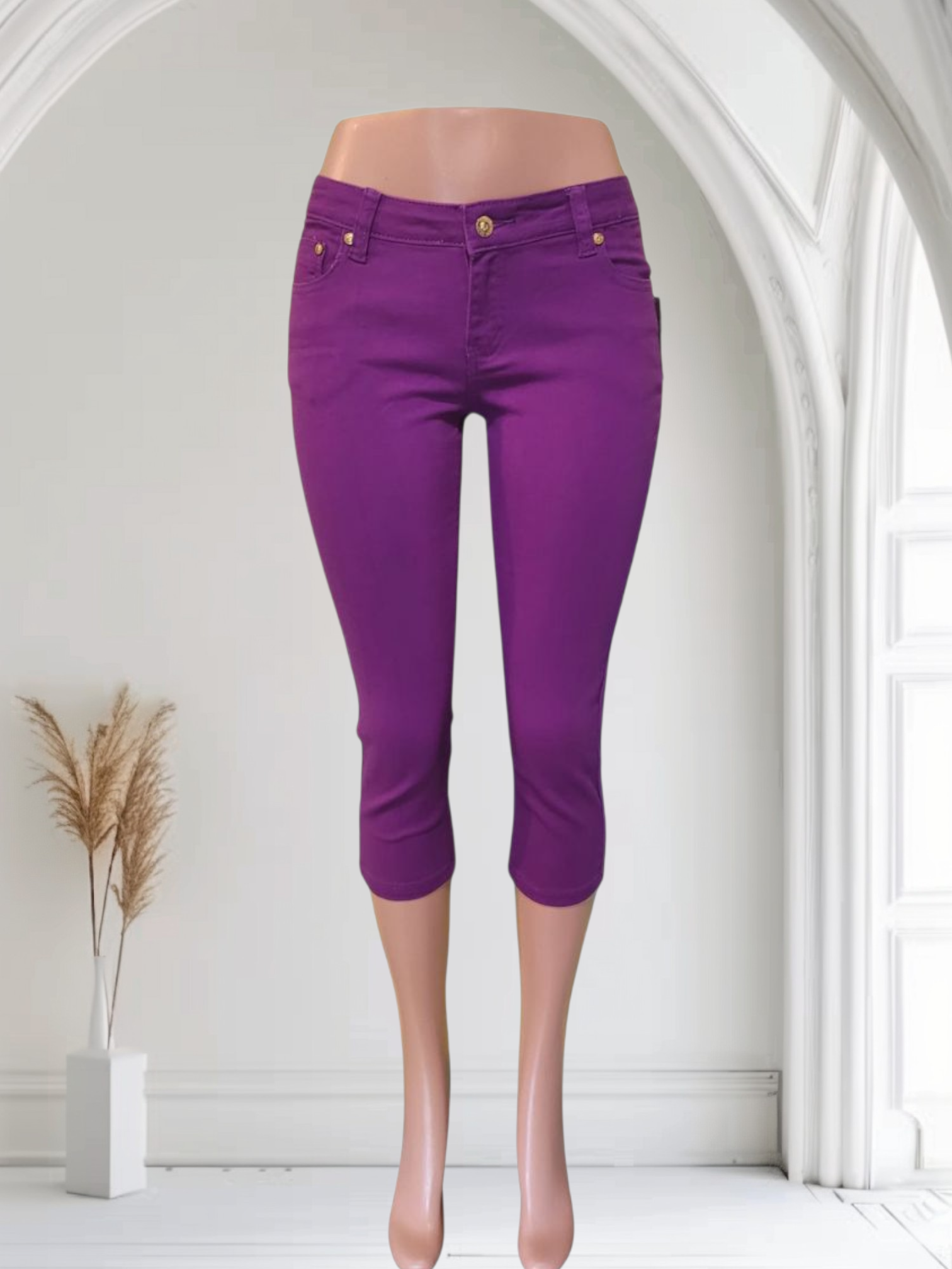 Purple capri on a mannequin against a white background  