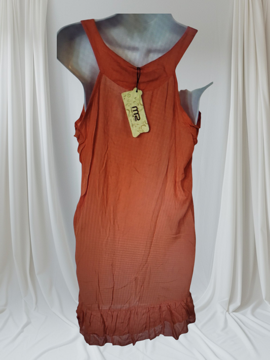 ORANGE DRESS ON A MANNEQIUN WITH A AGAINST A WHITE BACKGROUND
