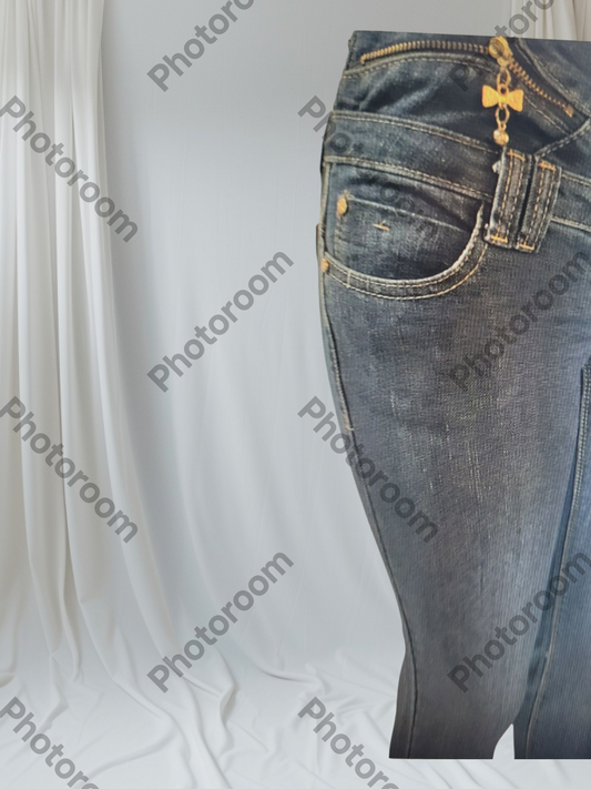 Blue jeans with gold buttons on a white background