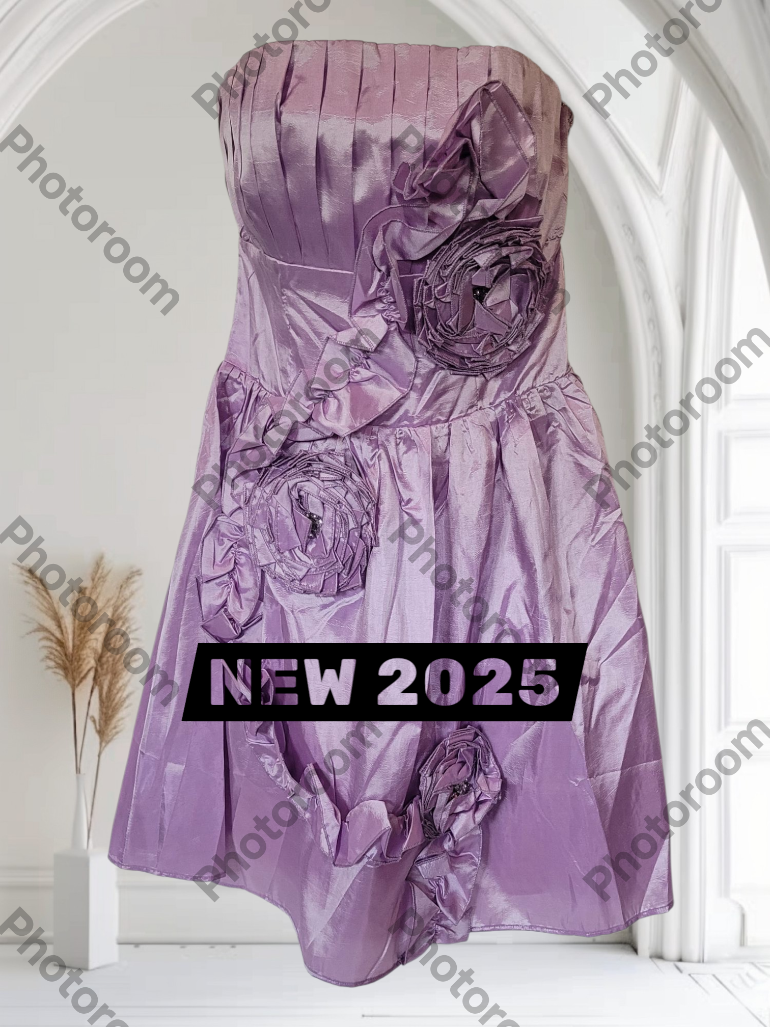 Purple strapless dress with floral embellishments on a white background