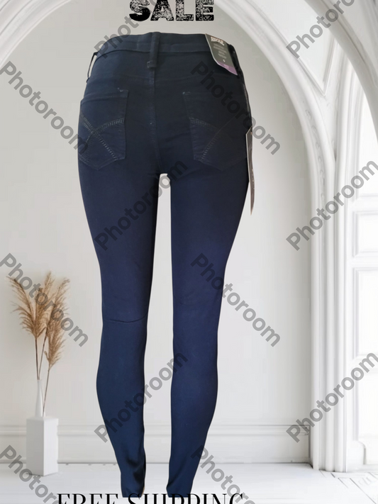 Navy blue jeans displayed against a white background with 'Photoroom' watermark.