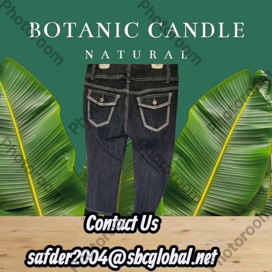 Dark blue jeans with white stitching on a green leafy background, featuring 'Botanic Candle Natural' branding.