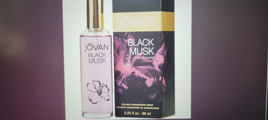 Jovan Black Musk cologne bottle and packaging on a dark background